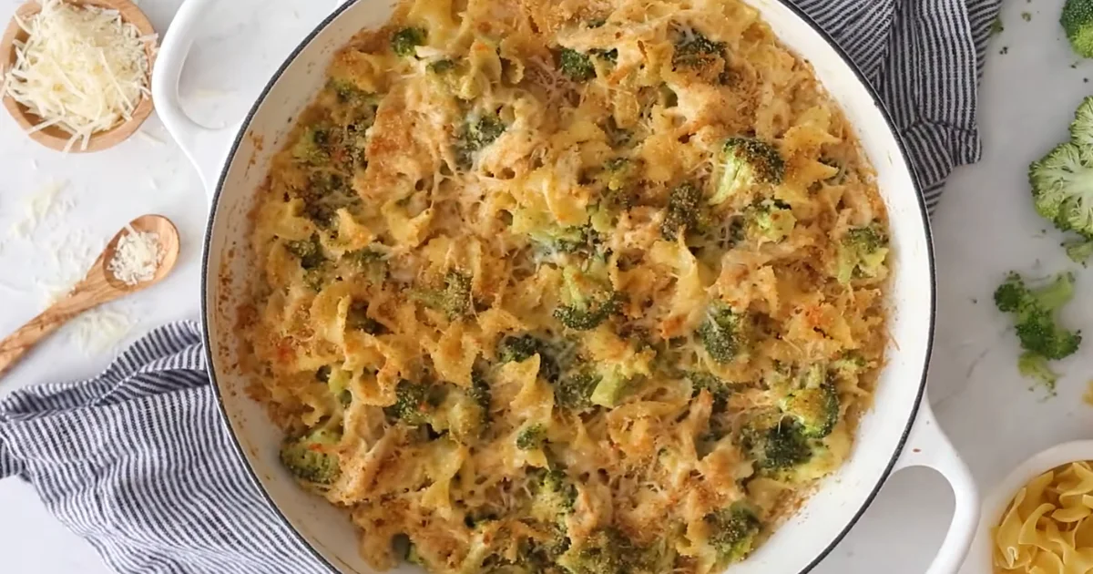 A delicious serving of Chicken Broccoli Noodle Casserole with creamy sauce and golden cheese on top.