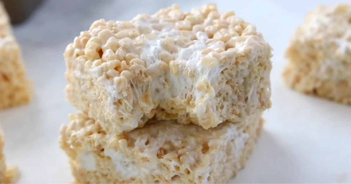 Delicious Brown Butter Rice Crispy Treats cut into squares, showcasing their golden color and rich, caramelized texture.