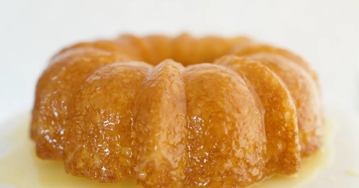 A moist and delicious Pineapple Juice Cake topped with creamy frosting.