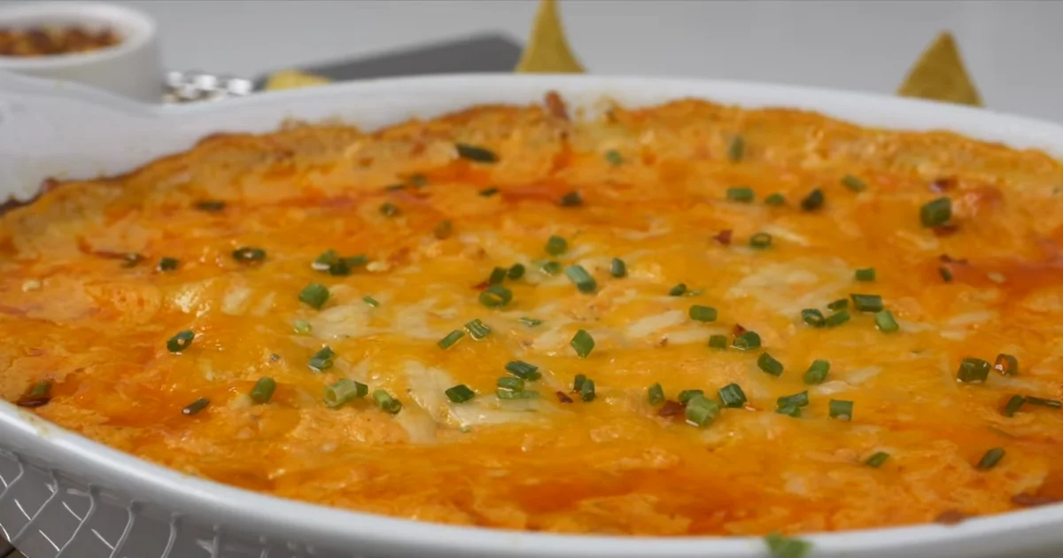Creamy Cottage Cheese Buffalo Chicken Dip served with crunchy tortilla chips and fresh celery sticks.
